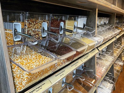 Rotacijski blažilnik za posode za razsuto hrano